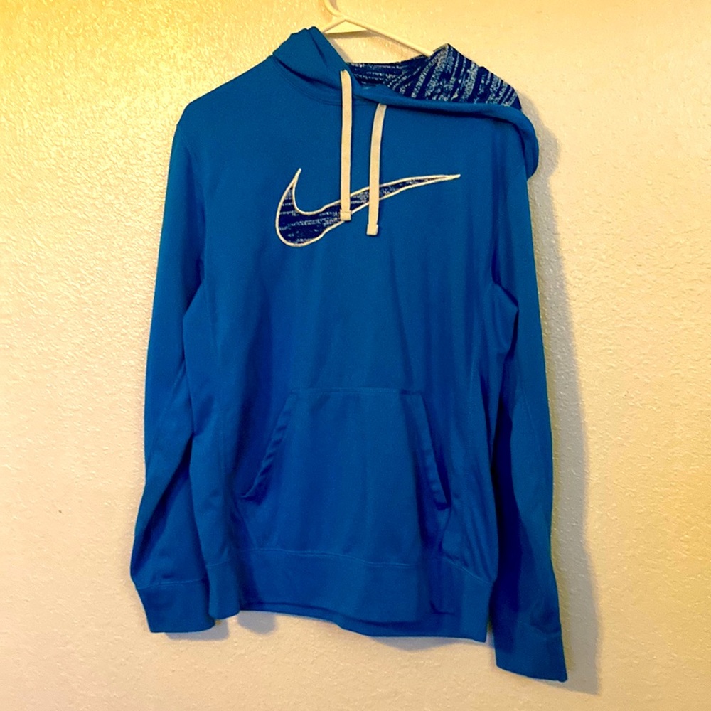Blue, Nike hoodie, well used but still in good condition.